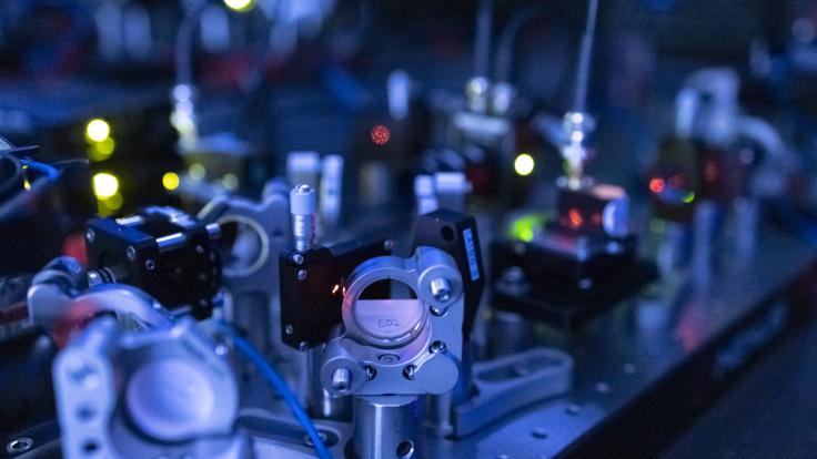 Quantum researchers at ORNL are investigating whether trapped ions can be used to encode qubits for quantum networking. Credit: ORNL/Carlos Jones