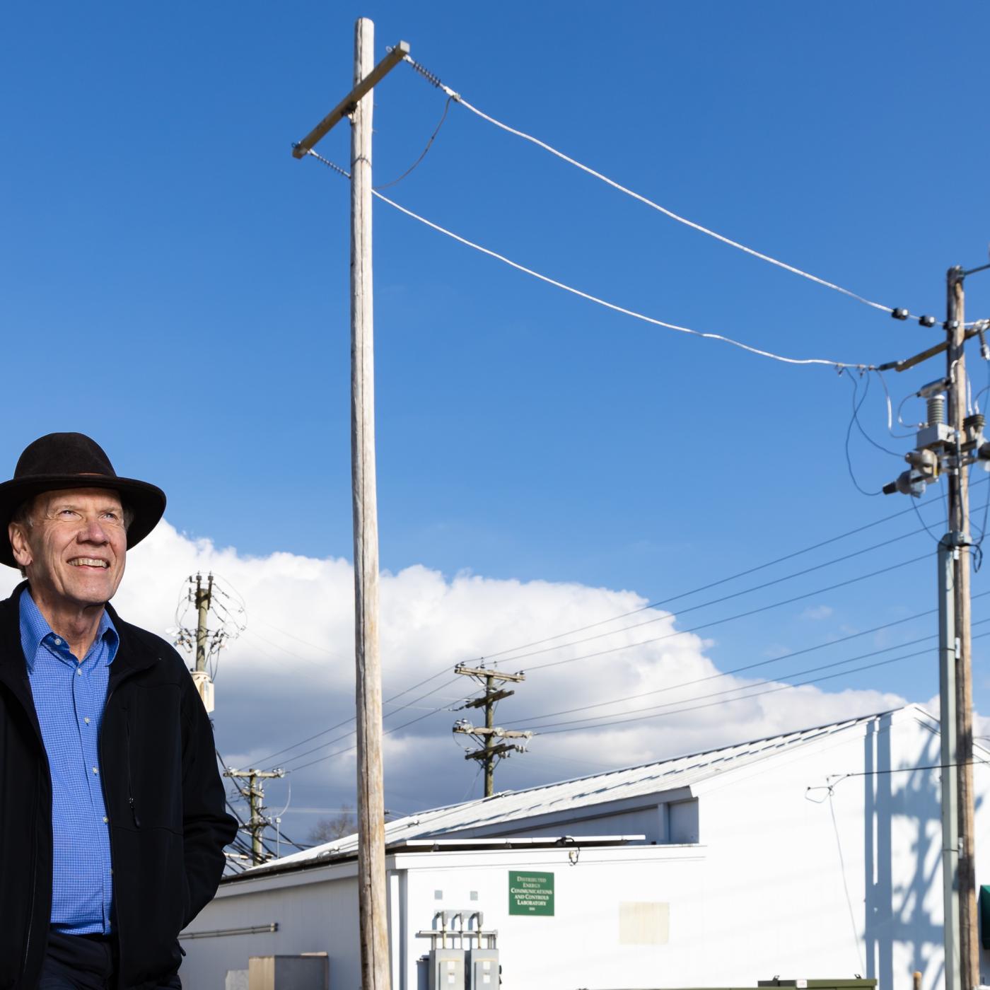 Bruce Warmack is using his physics and electrical engineering expertise to analyze advanced sensors for the power grid on a new testbed he developed at the Distributed Energy Communications and Controls Laboratory at ORNL. Credit: Carlos Jones/ORNL, U.S. Dept. of Energy