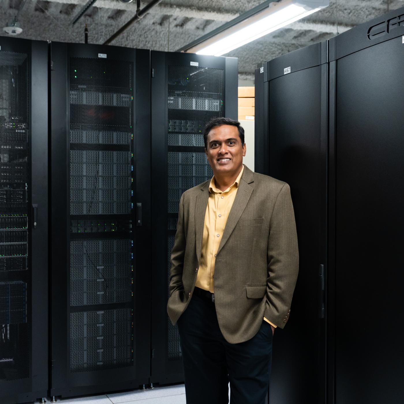Giri Prakash, director of the ARM Data Center, works with the latest ARM computing cluster at ORNL. Credit: Carlos Jones/ORNL, U.S. Dept. of Energy