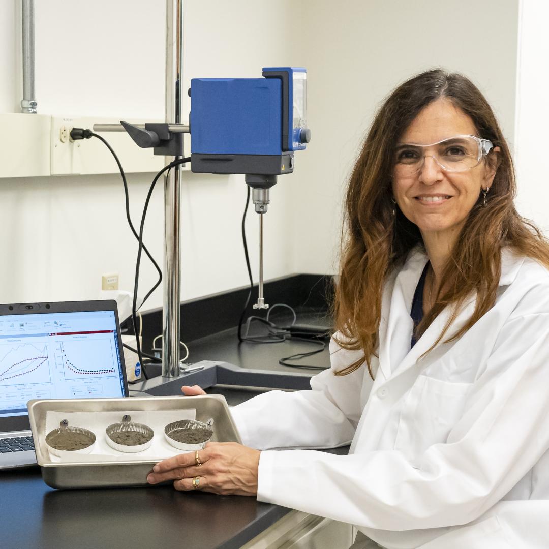 Materials scientist Denise Antunes da Silva researches ways to reduce concrete’s embodied carbon in the Sustainable Building Materials Laboratory at ORNL, a research space dedicated to studying environmentally friendly building materials. Credit: ORNL, U.S. Dept. of Energy