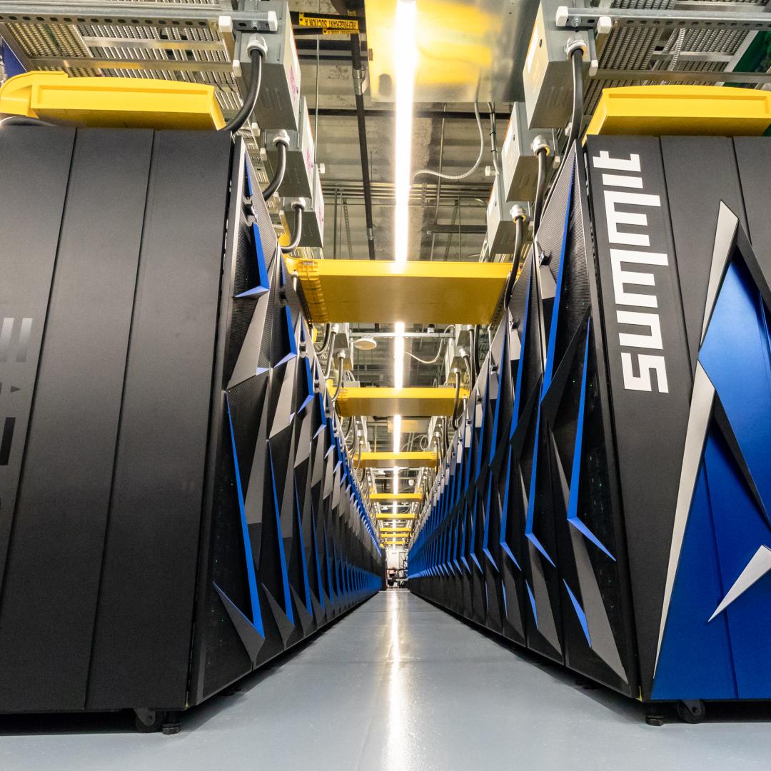 Two end caps of the Summit supercomputer showing the IBM and Summit logos