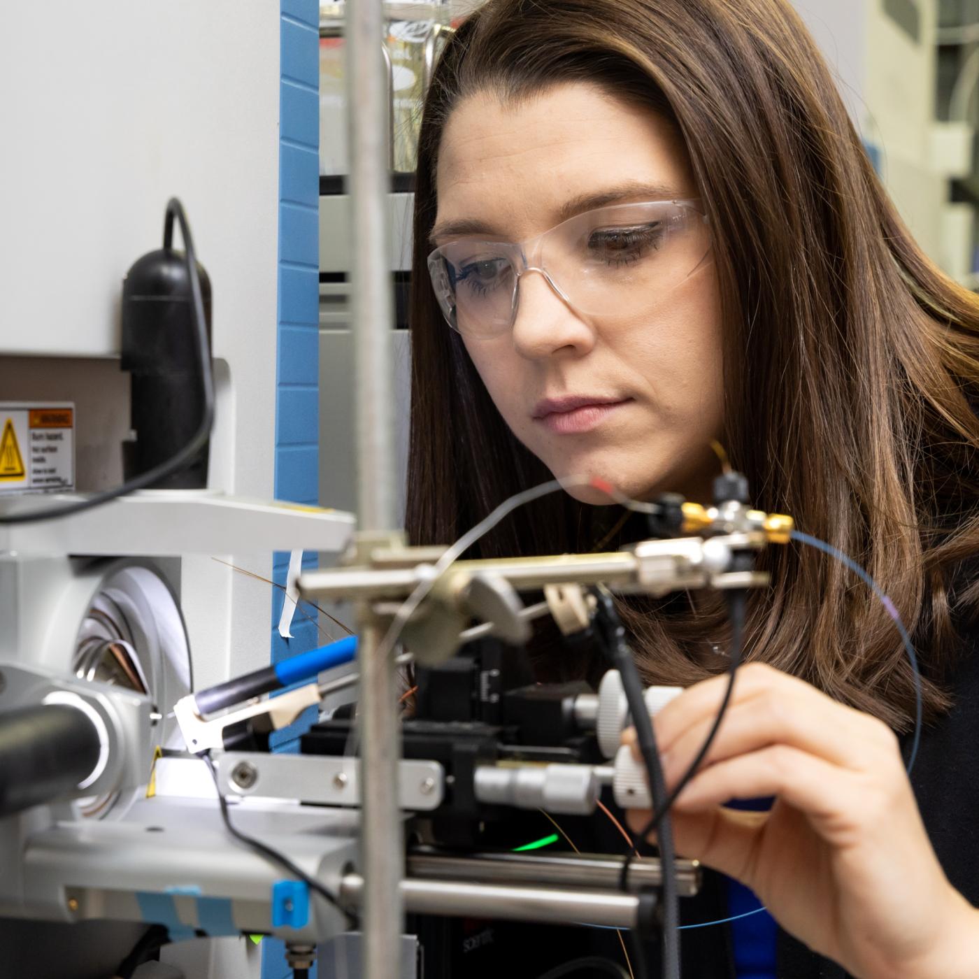 Samantha Peters co-designed and conducted experiments using ORNL’s high-performance mass spectrometry techniques to prove that bacteriophages deploy genetic code-switching to overwhelm and destroy host bacteria. Credit: Genevieve Martin, ORNL/U.S. Dept. of Energy
