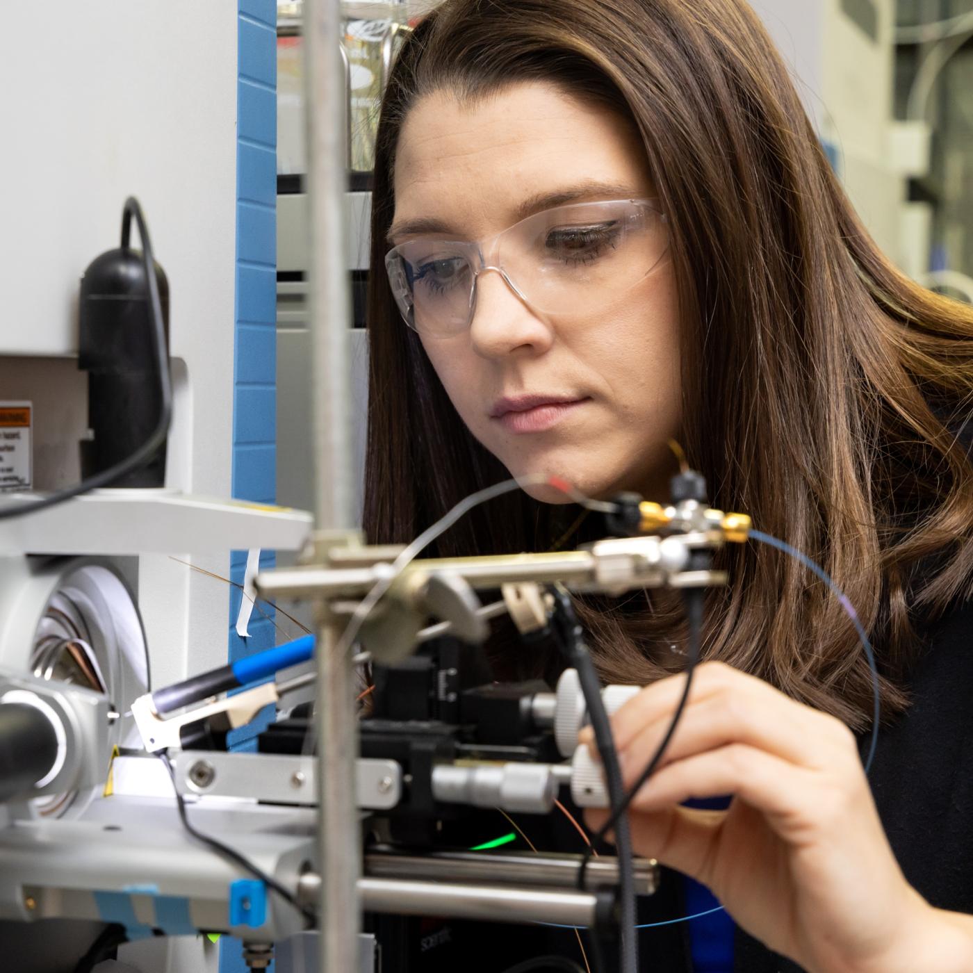 Samantha Peters co-designed and conducted experiments using ORNL’s high-performance mass spectrometry techniques to prove that bacteriophages deploy genetic code-switching to overwhelm and destroy host bacteria. Credit: Genevieve Martin, ORNL/U.S. Dept. of Energy