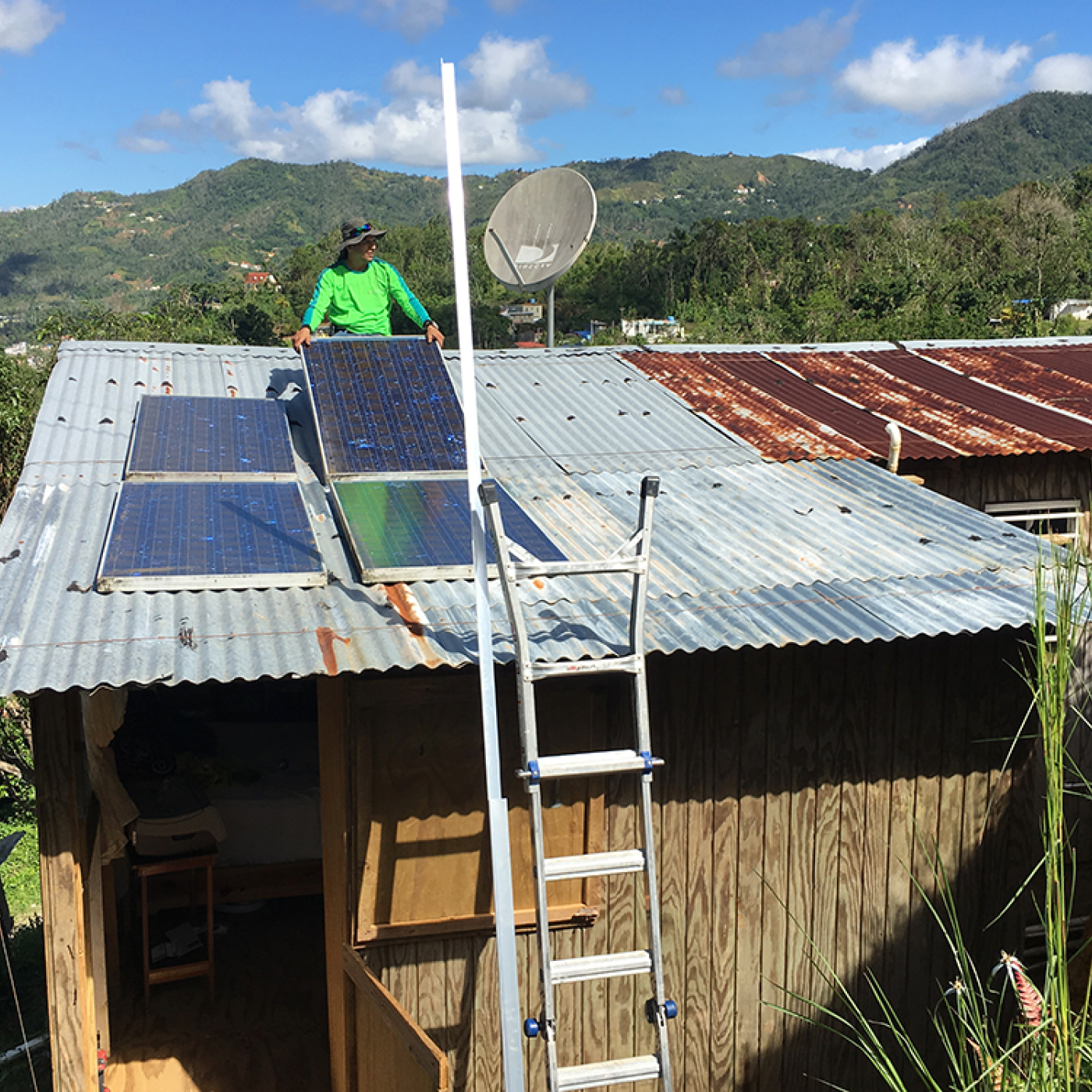 Through the Honnold Foundation and Casa Pueblo, solar panels are installed in Adjuntas, Puerto Rico, and hooked to microgrids with battery storage. ORNL researchers are developing a microgrid orchestrator to manage the microgrids together for increased long-term electrical reliability. Credit: Fabio Andrade