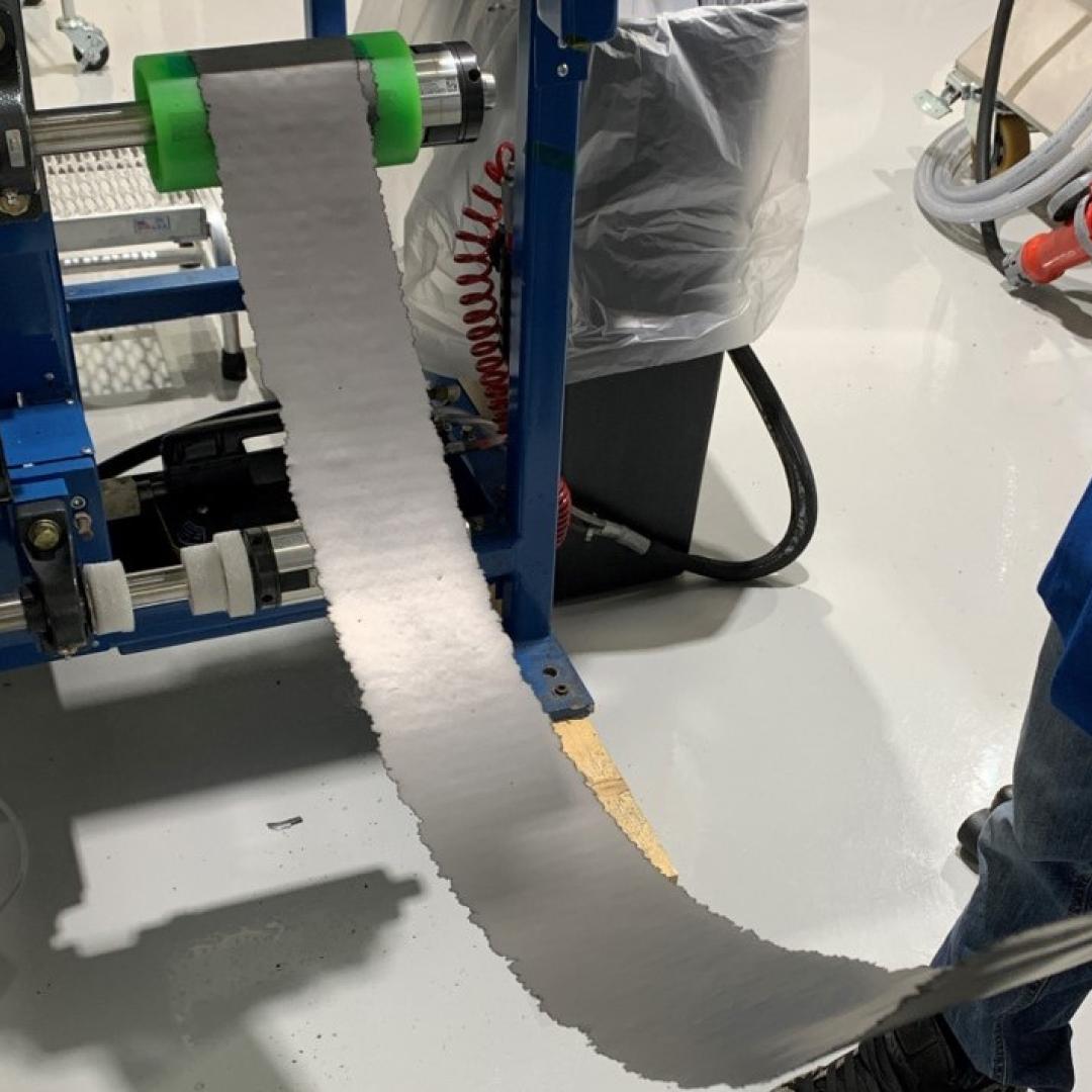 ORNL researchers found that a battery anode film, made by Navitas Systems using a dry process, was strong and flexible. These characteristics make a lithium-ion battery safer and more durable. Credit: Navitas Systems
