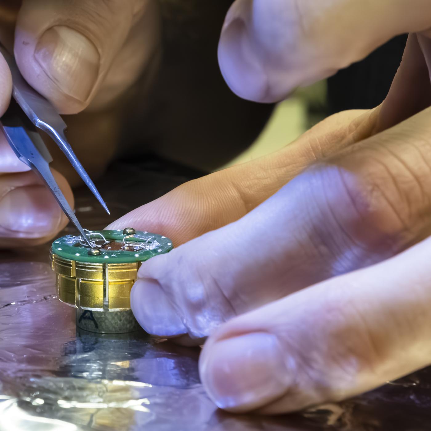 Connecting  wires to the interface of the topological insulator and superconductor enables probing of novel electronic properties. Researchers aim for qubits based on theorized Majorana particles. Credit: Carlos Jones/ORNL, U.S. Dept. of Energy