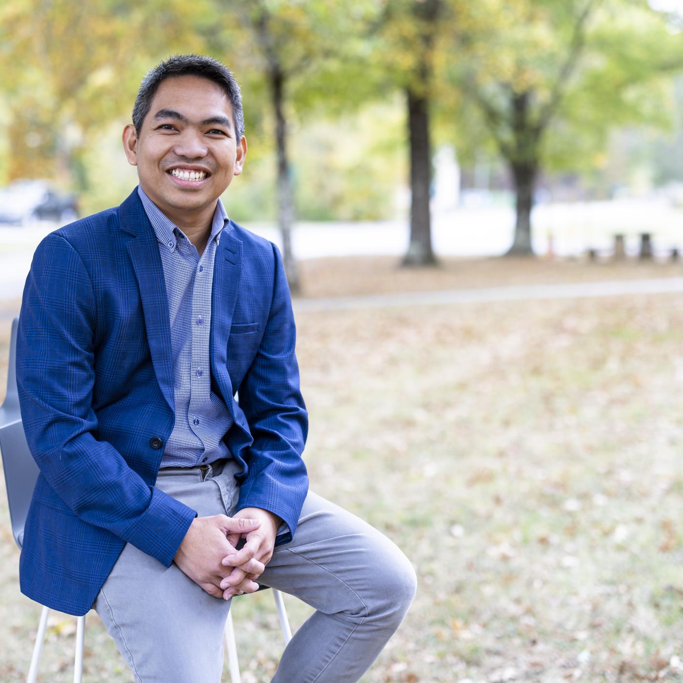 Christian Salvador is studying natural and manmade aerosols at Oak Ridge National Laboratory to improve our understanding of how atmospheric pollutants affect ecosystems and the Earth’s climate. Credit: Carlos Jones/ORNL, U.S. Dept. of Energy