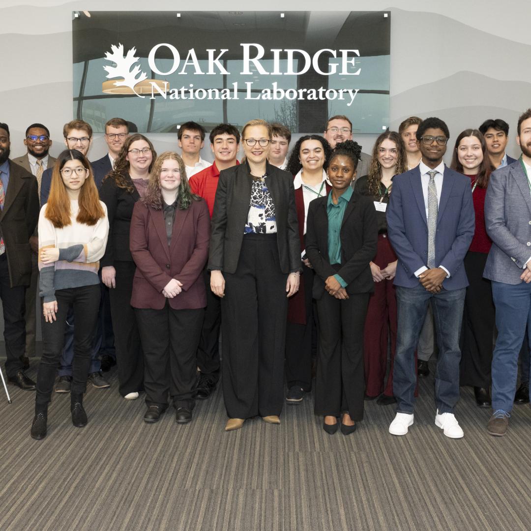 Mandy Mahoney, third from left, director of the DOE Office Of Energy Efficiency and Renewable Energy’s Building Technologies Office, welcomed 21 students representing seven universities across the nation to the sixth annual JUMP into STEM finals competition at Oak Ridge National Laboratory. Credit: Kurt Weiss/ORNL, U.S. Dept. of Energy