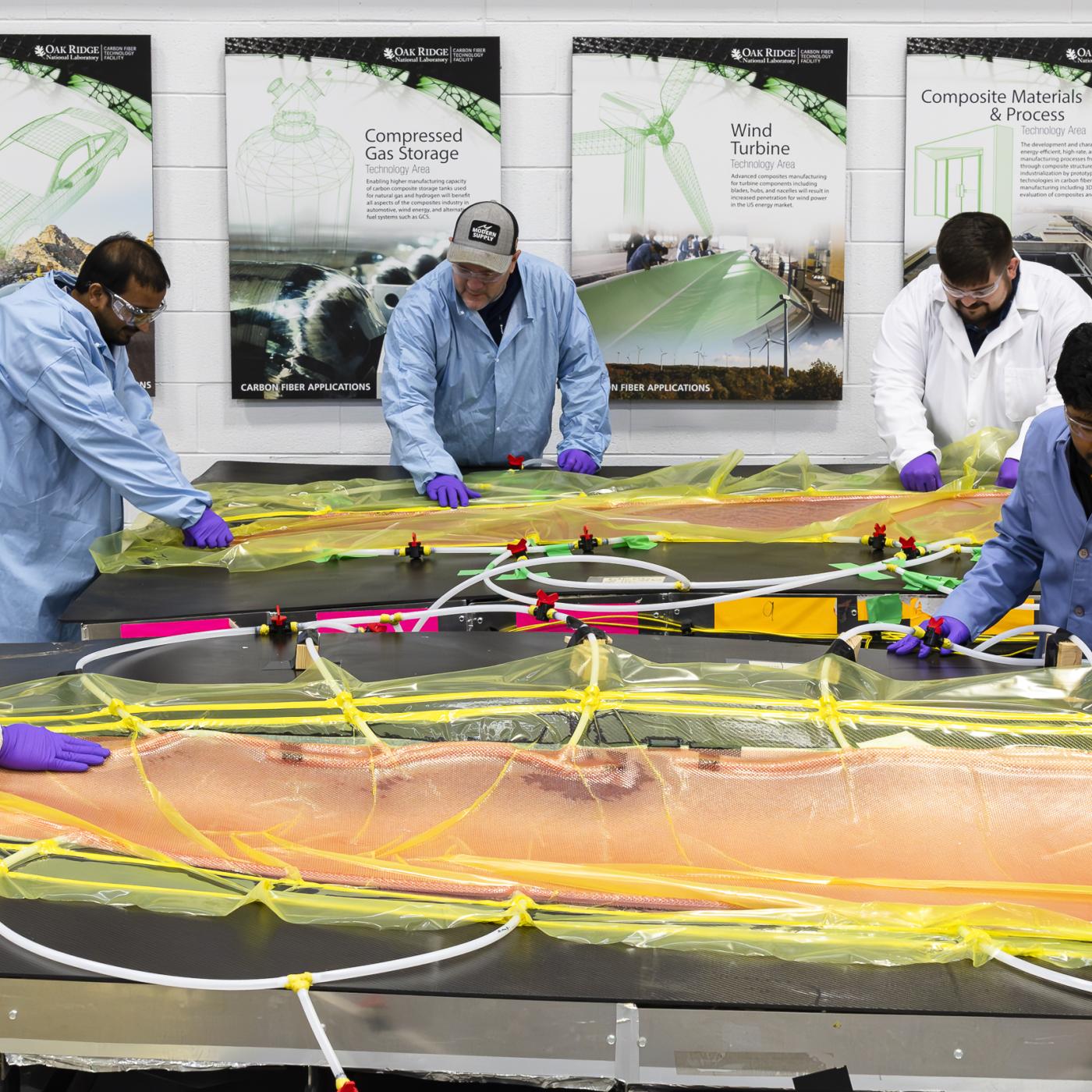 Team working on in green composites design for their fully-recyclable wind turbine blade tip incorporating low-cost carbon fiber