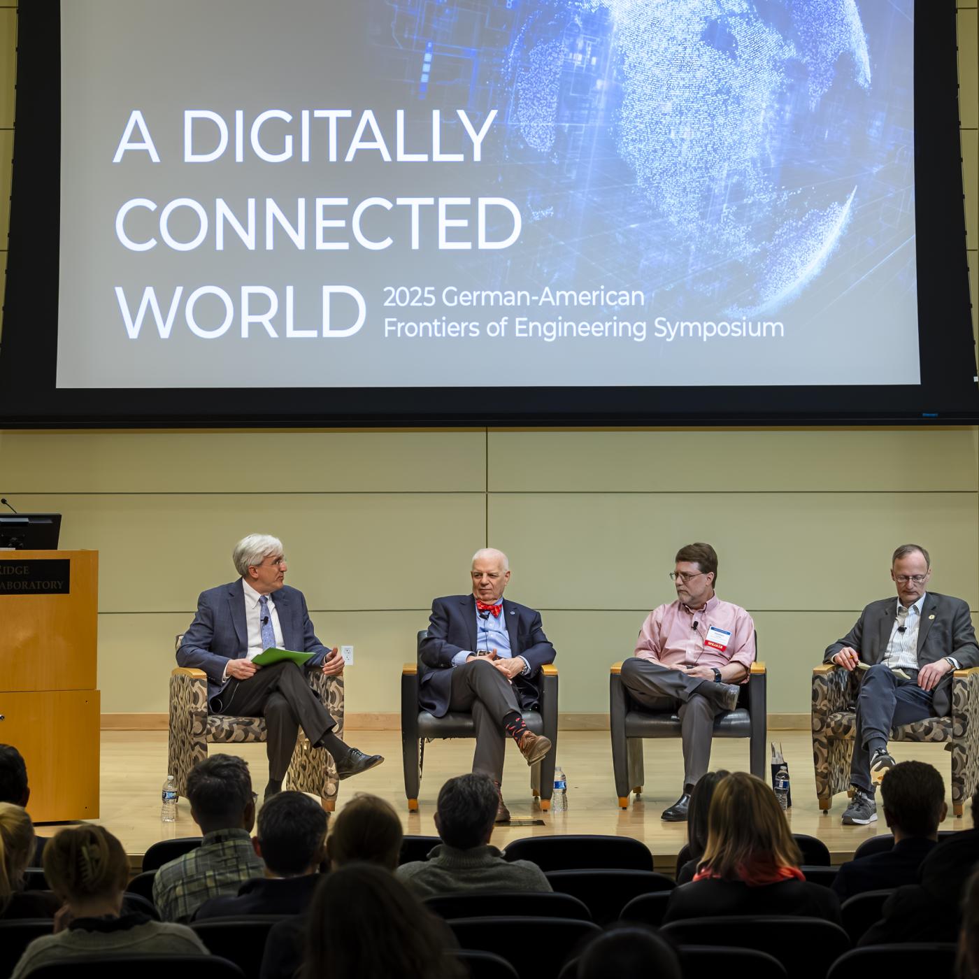 David Keim, far left, chief communications officer for ORNL, moderates a fireside chat with, left to right, Al Romig, NAE member and executive officer; Stephen Streiffer, ORNL laboratory director; and Walter Denk, with the Alexander von Humboldt Foundation; as part of the German-American Frontiers of Engineering Symposium. 