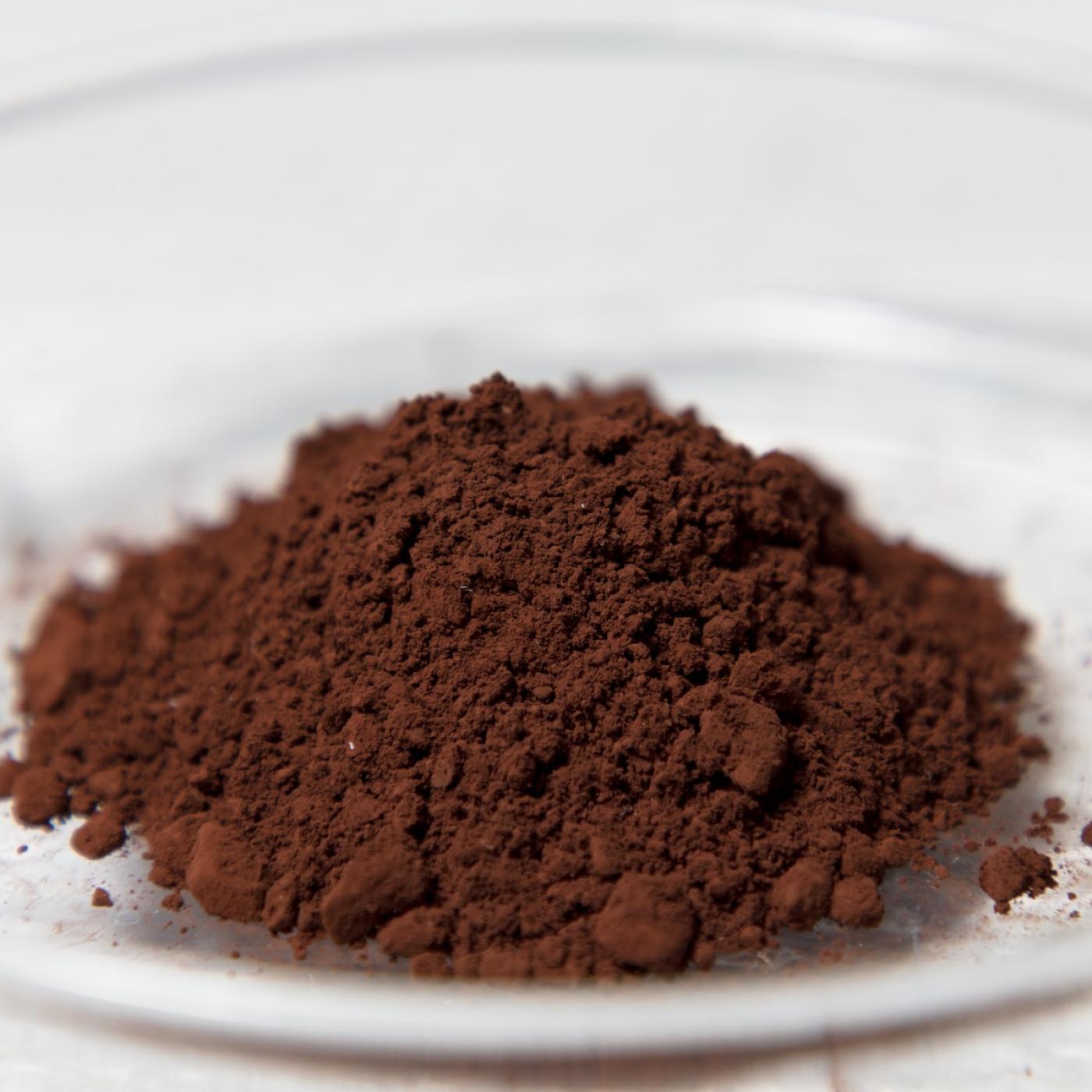Dark brown powder that is a rare earth element that has been refined into powder