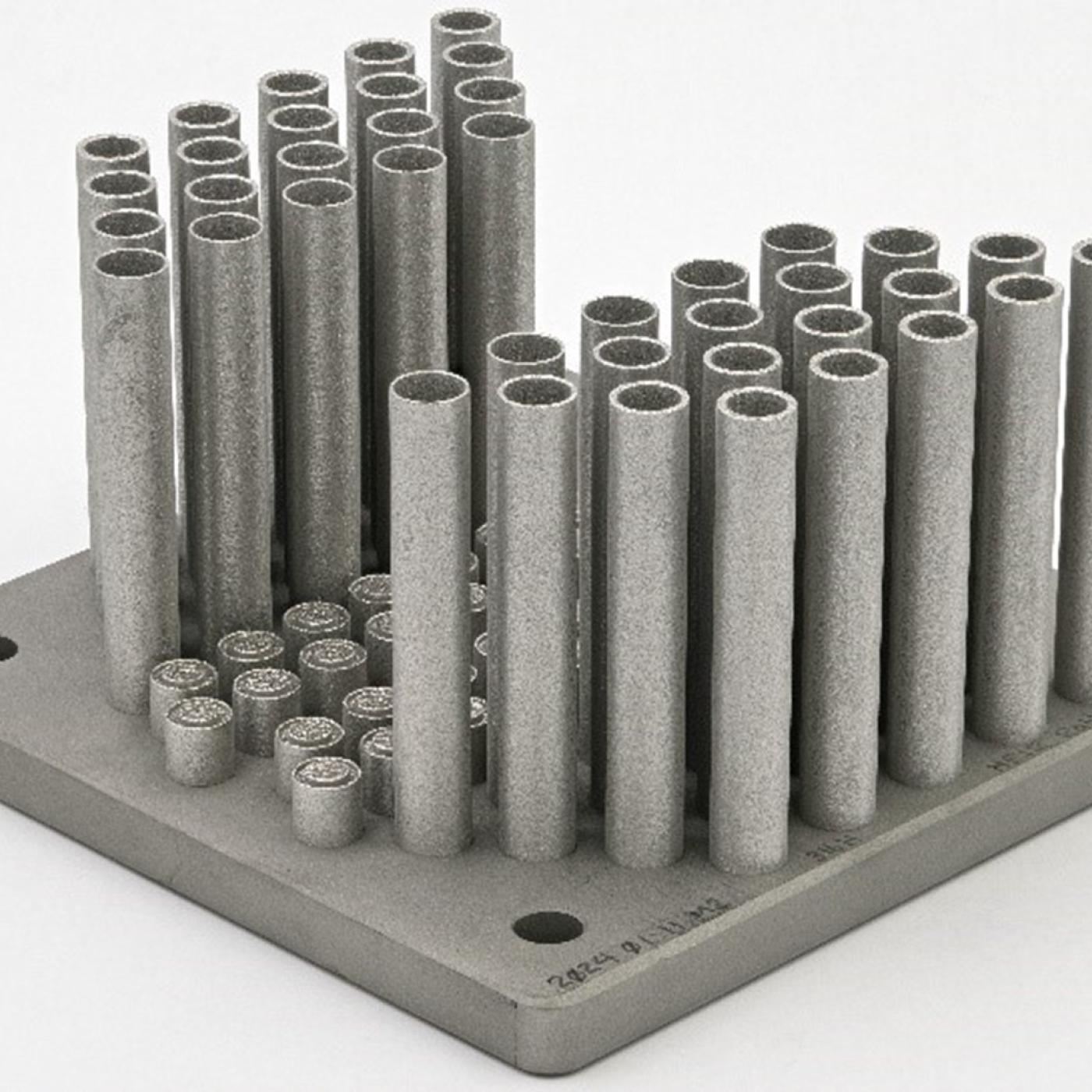 40 Stainless steel capsules 3D printed on a square board. 