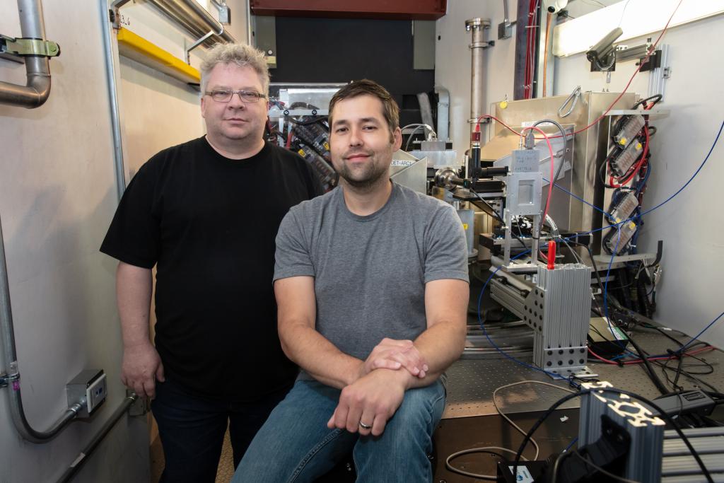 ORNL scientists Chris Tulk, left, and Jamie Molaison were part of a team that discovered a pathway to the unexpected formation of dense, crystalline phases of ice thought to exist beyond Earth’s limits. They used the unique neutron scattering capability of the Spallation Neutrons and Pressure Diffractometer at ORNL’s Spallation Neutron Source for the experiment.