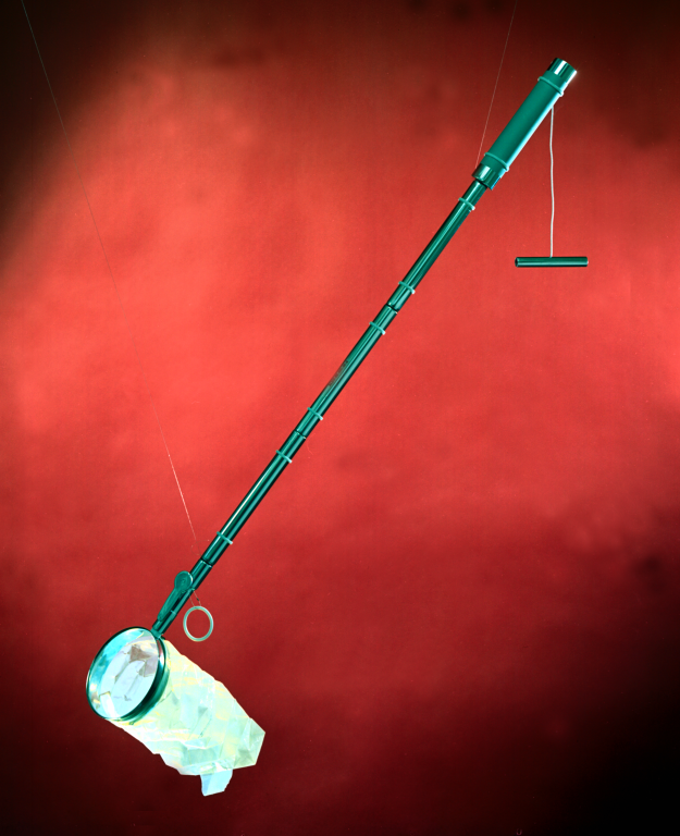 The contingency soil sampler’s pull cord and removable Teflon bag allowed the device to be completely folded and stowed on an astronaut’s space suit. The tool allowed astronauts with limited mobility to secure a small sample of lunar rock and soil without introducing outside contamination. Credit: Oak Ridge National Laboratory, U.S. Dept. of Energy.