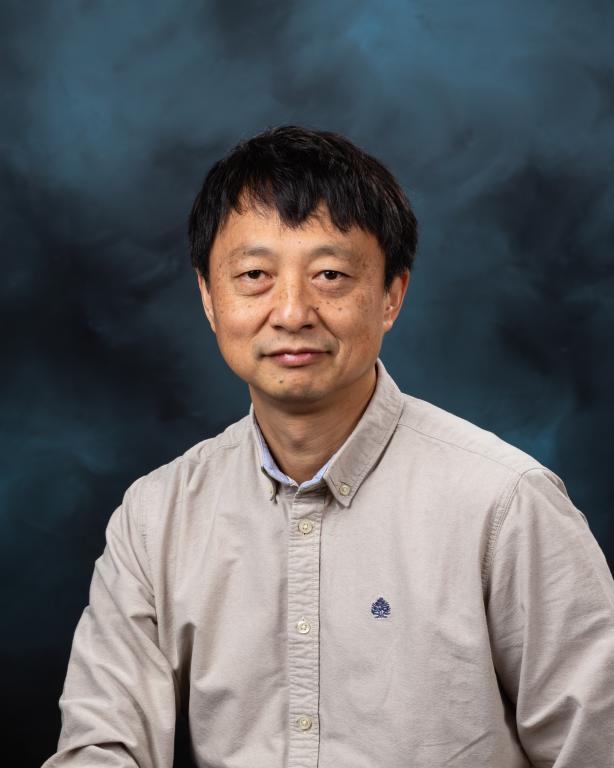 Frank Liu of ORNL leads a multi-institution project focused on improving the efficiency of complex systems with artificial intelligence. Credit: Carlos Jones/ORNL, U.S. Dept. of Energy