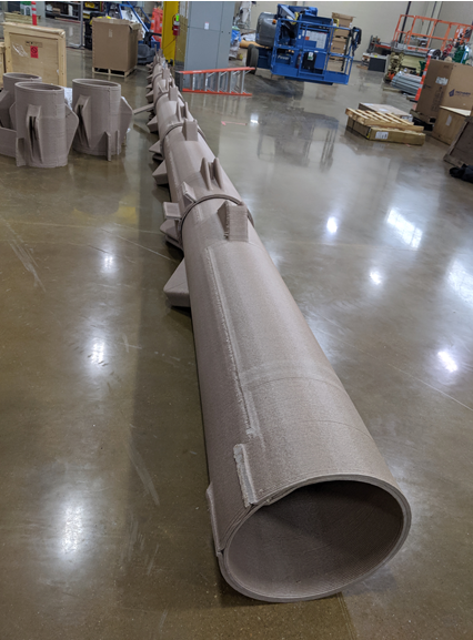 ORNL researchers demonstrated a 3D printed power pole made of bioderived and recycled materials could be easily manufactured, transported and assembled, enabling the quick restoration of power after natural disasters. Credit: ORNL, U.S. Dept. of Energy