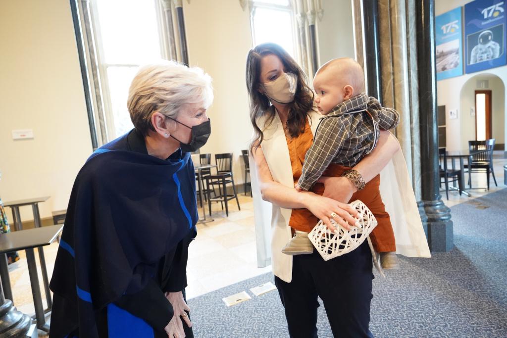 Energy Secretary Jennifer Granholm, left, meets ORNL advanced manufacturing researcher Amy Elliott and her son John Luke at the IfThenSheCan exhibit at the Smithsonian. 