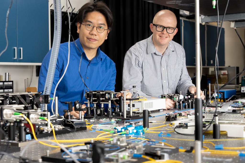 From left, Hsuan-Hao Lu and Joseph Lukens work in an ORNL quantum laboratory. Credit: Genevieve Martin/ORNL, U.S. Dept. of Energy