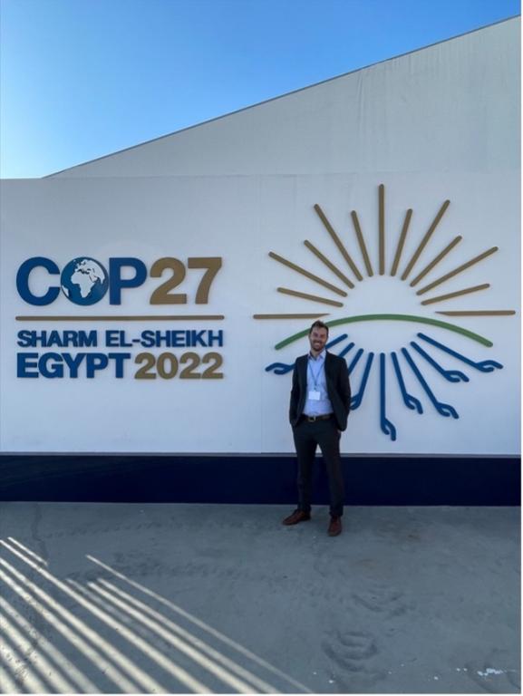 ORNL’s David McCollum, pictured at the entrance to COP27 in Sharm El-Sheikh Egypt, was one of more than 35,000 attendees at the annual United Nations Framework Convention on Climate Change. Credit: David McCollum