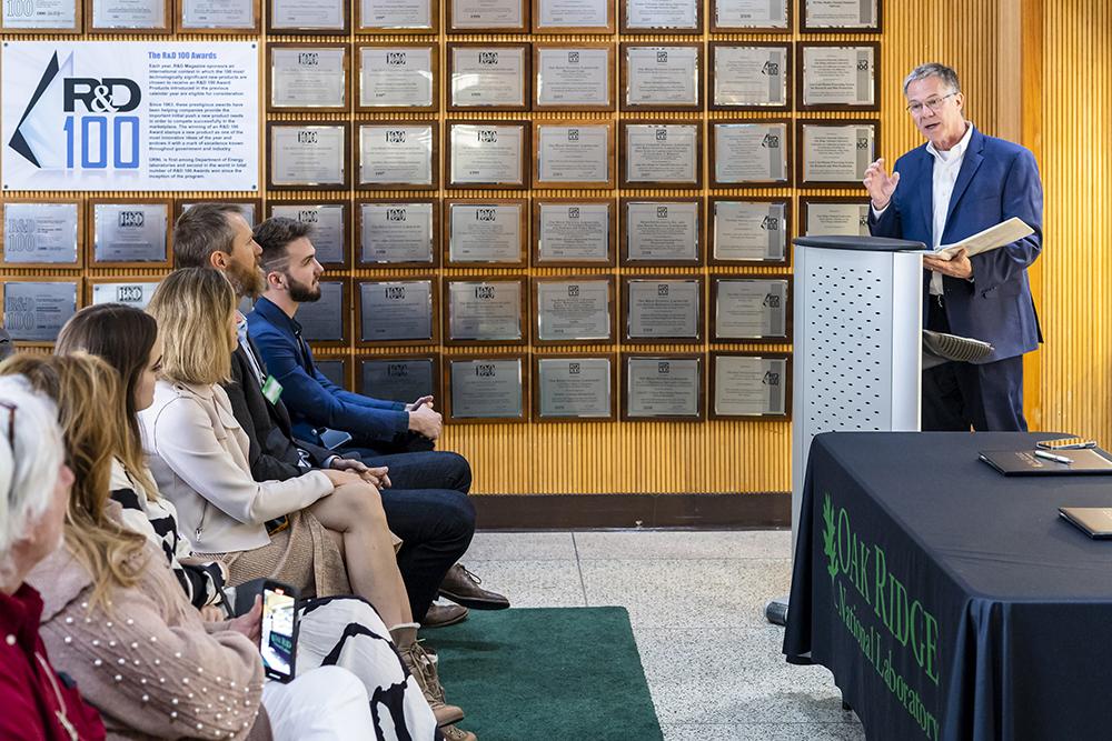 Mike Paulus, director of technology transfer, speaks to attendees at an event celebrating the licensing of AMIGO to Penguin Mustache. Credit: Carlos Jones/ORNL, U.S. Dept. of Energy