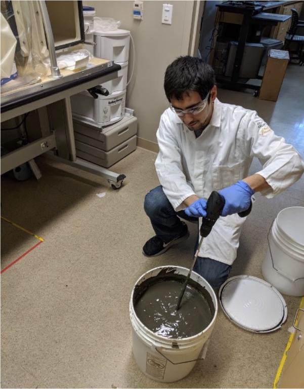 Undergraduate student Jesus Mercado homogenized reservoir sediments in the O’Day lab at UC Merced. Credit: UC Merced