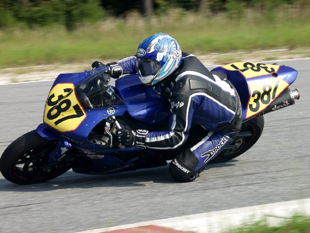 Ken Engle riding a motorcycle