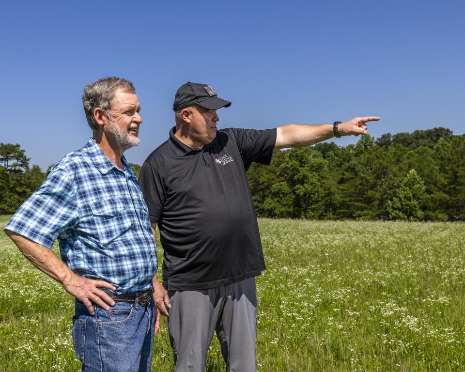 Steve Nolan, left, who manages many ORNL facilities for United Cleanup Oak Ridge, and Carl Dukes worked closely together to accommodate bringing members of the public into the Oak Ridge Reservation to collect distant images from overhead for the BRIAR biometric recognition project. Credit: Carlos Jones/ORNL, U.S. Dept. of Energy