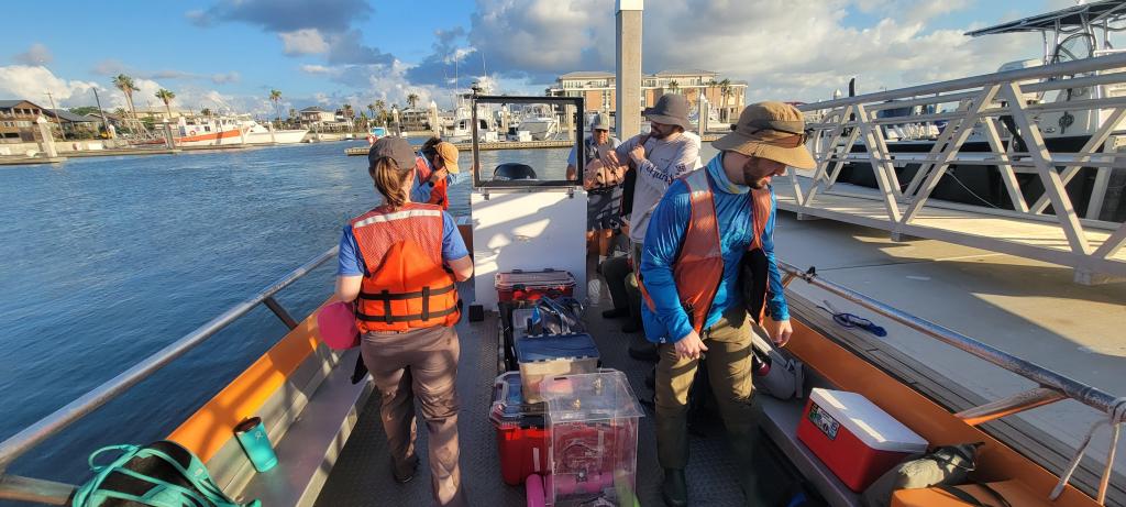 Launching from the dock with our collaborators and the equipment.