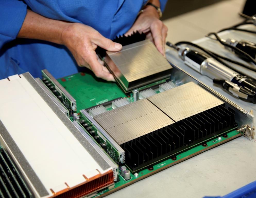 A technician installs GPUs on the Titan supercomputer. Credit: Curtis Boles/ORNL, U.S. Dept. of Energy