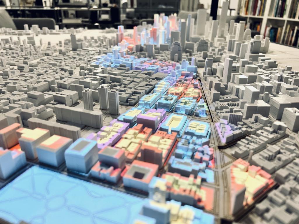 Caption: An interactive model demonstrates how a computer simulation framework, developed by Frank Li at Rensselaer Polytechnic Institute, can be used for city planning. Credit: Fengqi Li/ORNL, U.S. Dept. of Energy