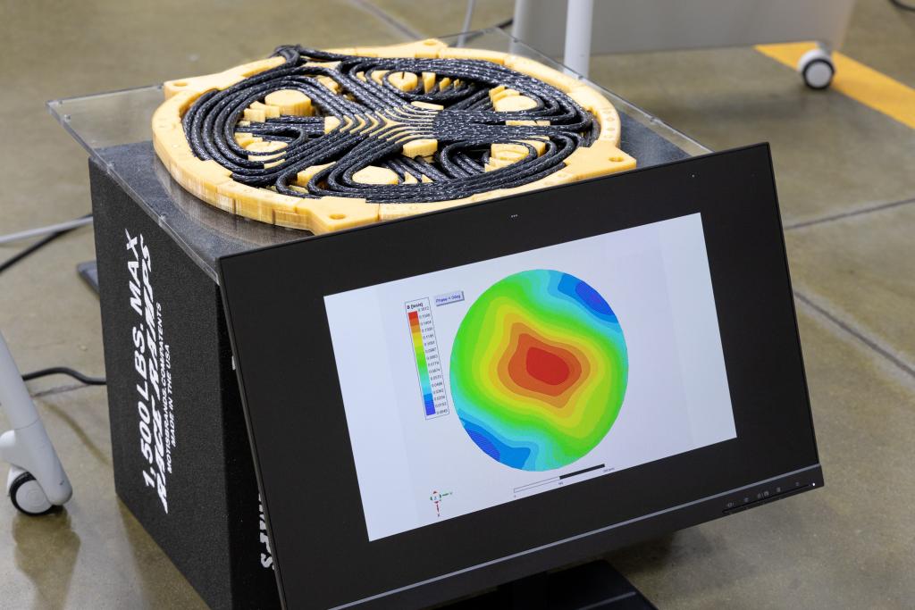 ORNL’s lightweight polyphase electromagnetic coupling coil design, with a diameter just over 14 inches, allows for higher power density in smaller coils and includes rotating magnetic fields generated by coil phase windings. Credit: Genevieve Martin/ORNL, U.S. Dept. of Energy