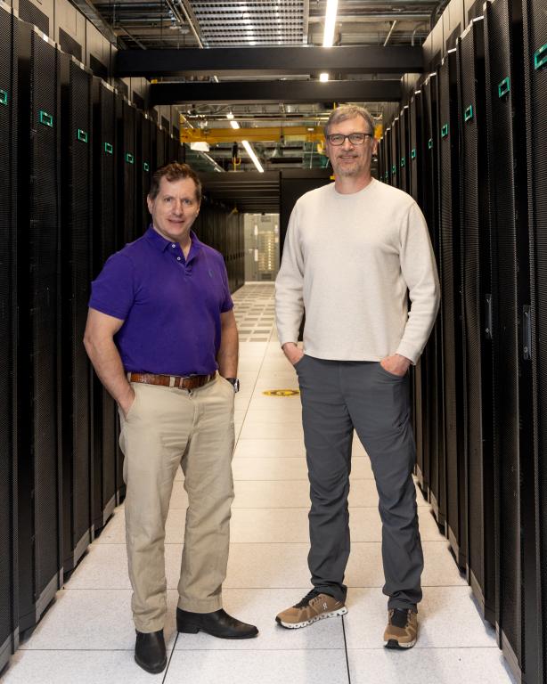 Architects of the Adaptable IO System, seen here with Frontier's Orion file system: Scott Klasky, left, heads the ADIOS project and leads ORNL's Workflow Systems group, and Norbert Podhorszki, an ORNL computer scientist, oversees ADIOS's continuing development. 
