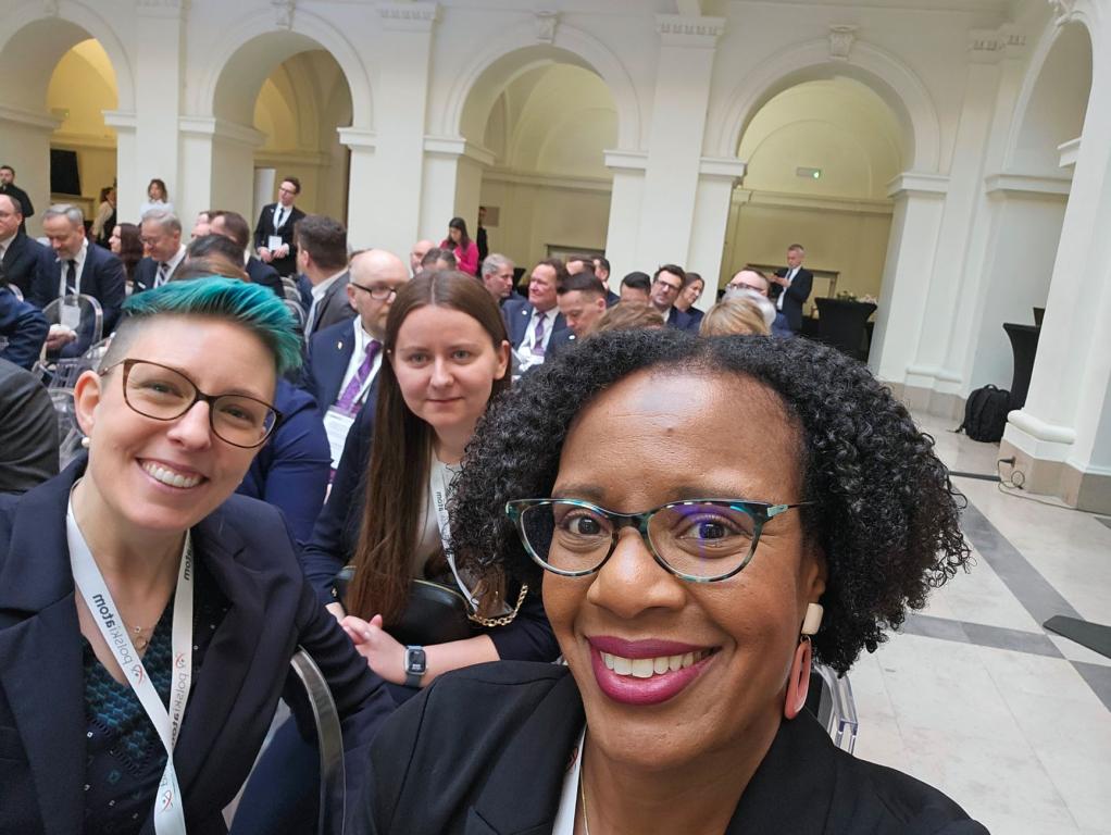 ORNL's Gale Hauck, Kate Borowiec, and DeLeah Lockridge pose for a selfie at the opening of Poland's first Clean Energy Training Center in Warsaw, Poland. Photo Credit: DeLeah Lockridge