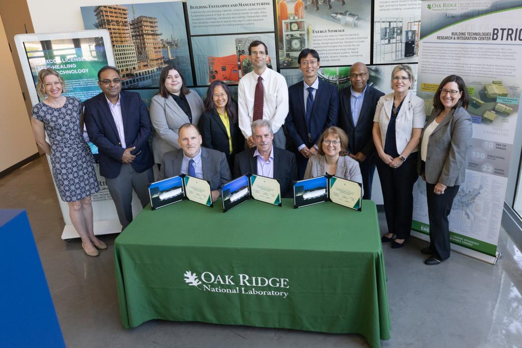Flexcon Global gathered with ORNL to license two patented inventions