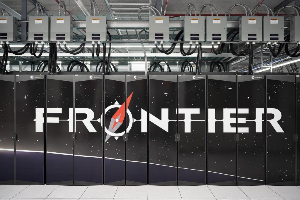 Frontier Supercomputer pictured with the logo written across the cabinets
