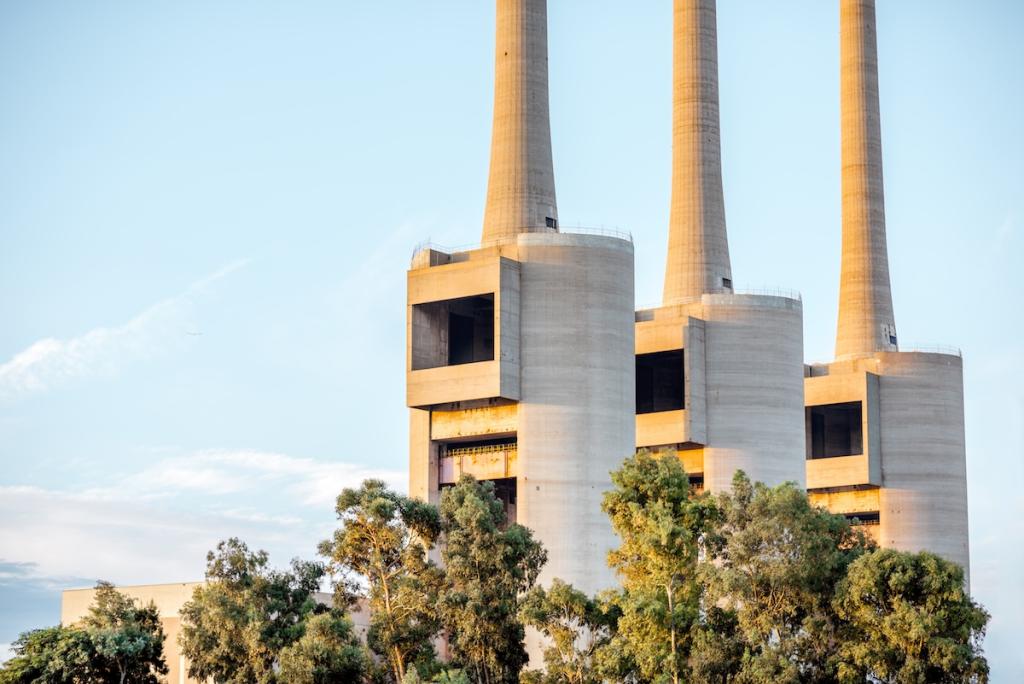Three concrete industrial towers in Badalona region of Barcelona city. Image from Envato