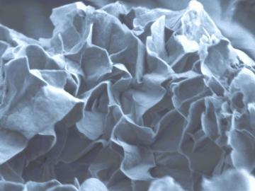 A flowy grey image is pictured, with light and dark grey tones, no pattern