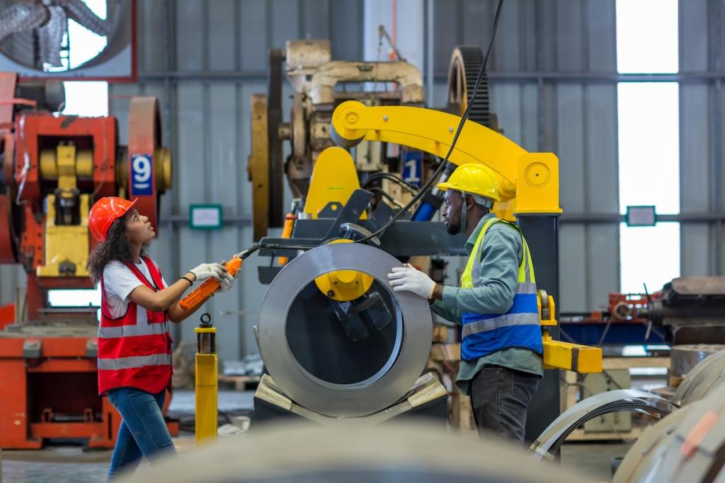 Foreman or worker work at factory site check up machine or products in site. Image from Envato