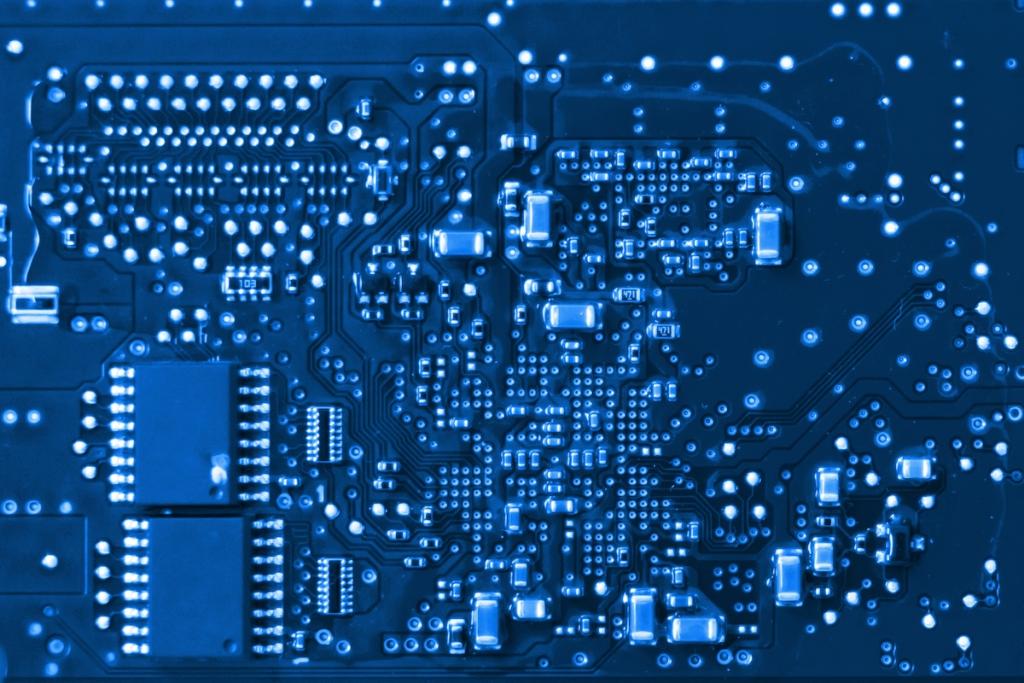 Close up of PCB board and IC chip, Electronic circuit board. Image from Envato