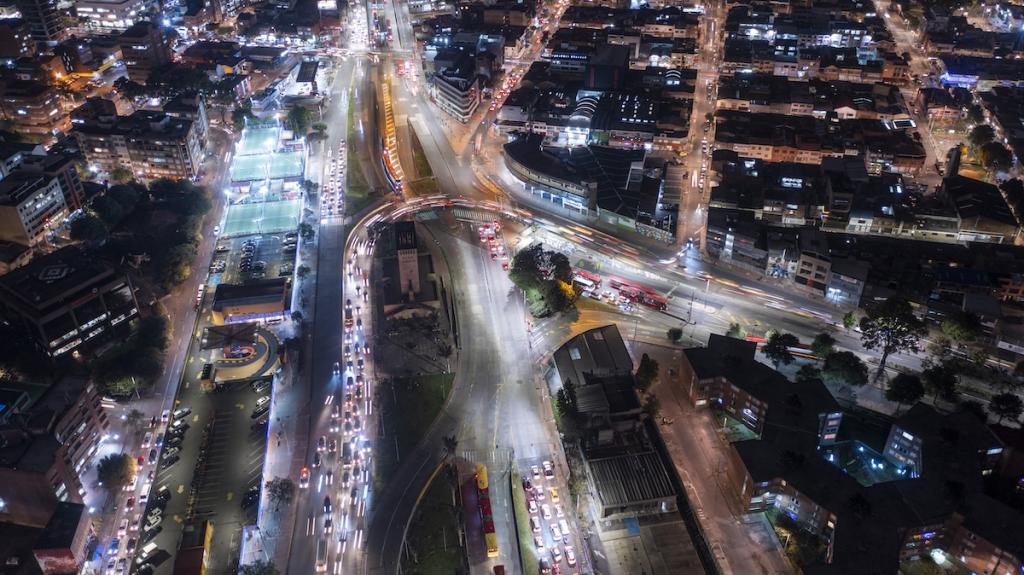 Aerial view of busy streets of Bogota at night. Image from Envato