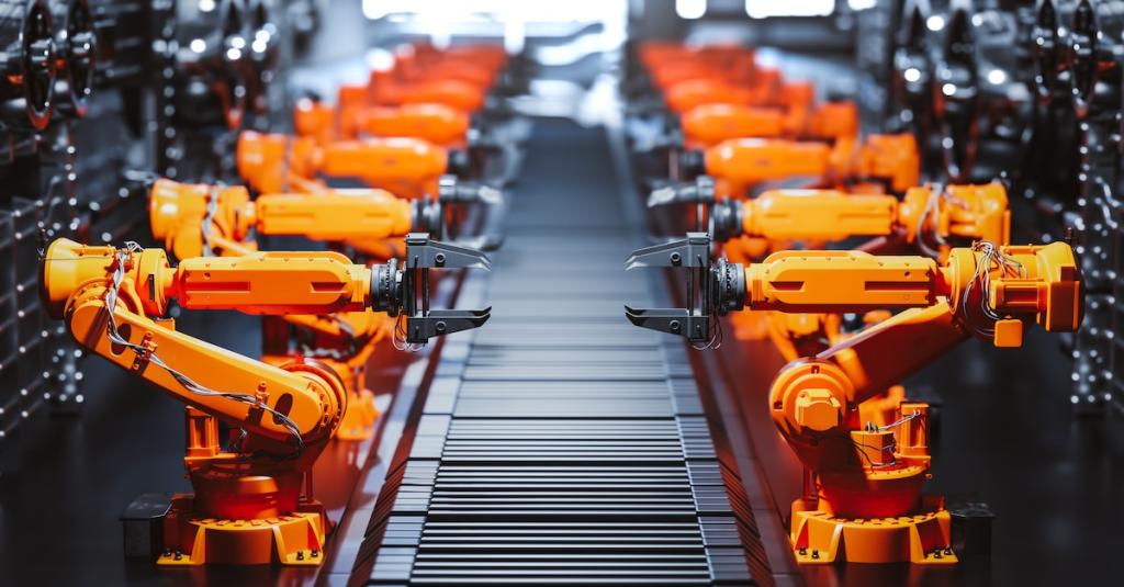 Robotic arms along assembly line in modern factory. Heavy industry, technology and machine learning. 3D rendering. Image from Envato