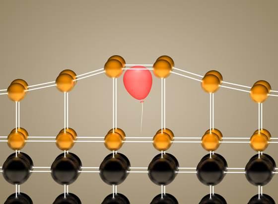 Helium implantation as strain doping