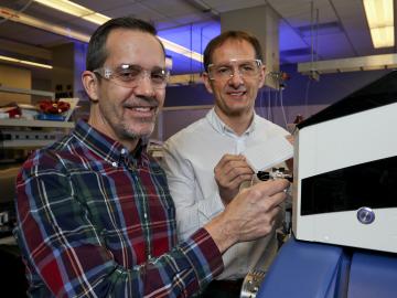 Oak Ridge National Laboratory’s Open Port Sampling Interfaces for Mass Spectrometry, invented by Gary Van Berkel (left) and Vilmos Kertesz, features simplicity and elegance. Oak Ridge National Laboratory’s Open Port Sampling Interfaces for Mass Spectrometry, invented by Gary Van Berkel (left) and Vilmos Kertesz, features simplicity and elegance.