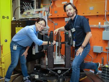 Professors Zhenzhen Yu (left) and Michael Joachim Andreassen use neutrons at HFIR’s NRSF2 to investigate residual stresses expected to occur in the welds of offshore underwater wind turbine foundations. (Credit: ORNL/Genevieve Martin)