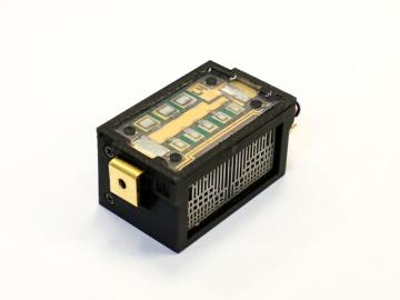The solar inverter’s power package features an air-cooled, 3D printed heat sink. The project is supported by the SunShot National Laboratory Multiyear Partnership program of the DOE Solar Energy Technologies Office. Credit: Jason Richards/ORNL, USDOE