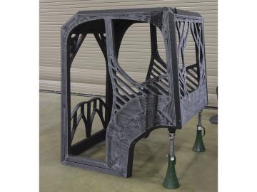 The first-ever 3D printed excavator will include a cab designed by a University of Illinois at Urbana-Champaign student engineering team and printed at DOE’s Manufacturing Demonstration Facility at ORNL using carbon fiber-reinforced ABS plastic. 