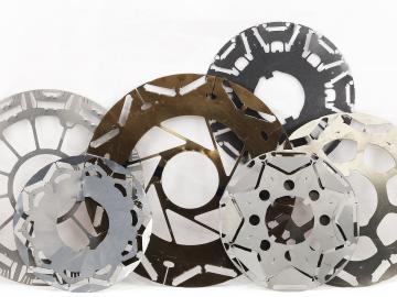 Laminations such as these are compiled to form the core of modern electric vehicle motors. ORNL has developed a software toolkit to speed the development of new motor designs and to improve the accuracy of their real-world performance.