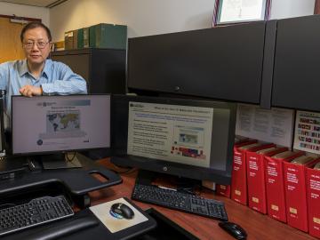 Weiju Ren’s knowledgebase is making the nuclear world safer. Called DOE’s Gen IV Materials Handbook, it manages data about structural materials for the Very High Temperature Reactor. Credit: Carlos Jones/Oak Ridge National Laboratory, U.S. Dept. of Energy
