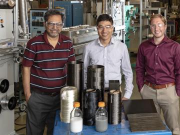 From left, Amit Naskar, Ngoc Nguyen and Christopher Bowland in ORNL’s Carbon and Composites Group bring a new capability—structural health monitoring— to strong, lightweight materials promising for transportation applications.