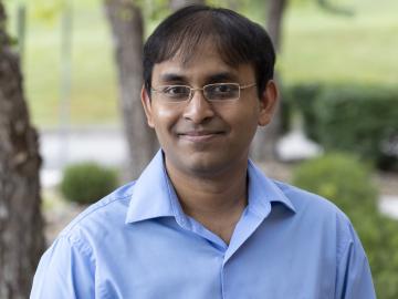 Suman Debnath is using simulation algorithms to accelerate understanding of the modern power grid and enhance its reliability and resilience. Credit: Carlos Jones/ORNL, U.S. Dept. of Energy